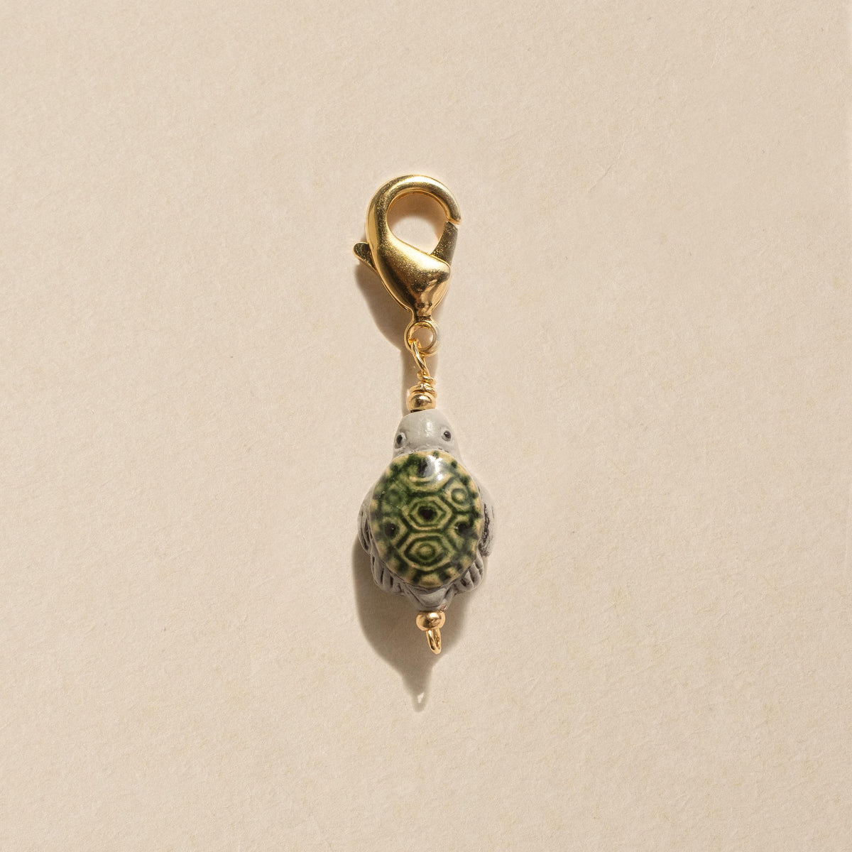 TURTLE CHARM - Pajarolimon Colombia